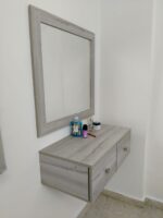 Interior Design. floating dressing table, wall mounted dressing table, floating vanity table, modern floating dressing table, floating makeup vanity, space saving dressing table, wall hung dressing table, floating vanity with mirror, LED mirror floating dressing table, wooden floating dressing table, floating dressing table with drawers, compact floating dressing table, minimalist floating vanity, floating dressing console, wall mounted vanity table with storage, white floating dressing table, gloss floating dressing table, floating corner dressing table, luxury floating vanity table, sleek wall mounted dressing table, floating makeup console with drawer, wall mounted vanity shelf, floating bedroom vanity unit, modern wall mounted dressing table design, custom floating vanity drawer.