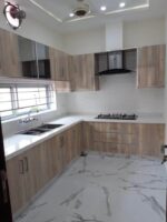 Interior Design. L shaped kitchen, L shaped kitchen layout, modern L shaped kitchen, custom L shaped kitchen, small L shaped kitchen, large L shaped kitchen, L shaped kitchen with island, L shaped kitchen with breakfast bar, handleless L shaped kitchen, shaker style L shaped kitchen, modular L shaped kitchen, open plan L shaped kitchen, corner L shaped kitchen, floor to ceiling L shaped kitchen, two tone L shaped kitchen, wood finish L shaped kitchen, high gloss L shaped kitchen, matte finish L shaped kitchen, minimalist L shaped kitchen, luxury L shaped kitchen, apartment L shaped kitchen, villa L shaped kitchen, integrated L shaped kitchen, ergonomic L shaped kitchen, space saving L shaped kitchen.