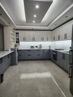 Interior Designers. Modern L-shaped kitchen designs, L-shaped kitchen, modern L-shaped kitchens, L-shaped kitchen cabinets, contemporary kitchen designs, modern kitchen cabinets, custom kitchen cabinets, fitted kitchen cabinets, modular kitchen designs, luxury kitchen designs, stylish kitchen interiors, minimalist kitchen designs, open-plan L-shaped kitchen, small L-shaped kitchen, large L-shaped kitchen, compact kitchen designs, modern kitchen storage, kitchen island ideas, kitchen countertop designs, kitchen backsplash ideas, kitchen cabinet installation, kitchen renovation, custom kitchen installation, fitted kitchen solutions, kitchen interior design, modern kitchen furniture, luxury kitchen interiors, contemporary kitchen cabinets, sleek kitchen designs, functional kitchen layouts, space-saving kitchen designs, kitchen design and installation, bespoke kitchen cabinets, modern kitchen lighting, kitchen pantry storage, kitchen accessories, kitchen sinks and countertops, kitchen hardware, kitchen interior design Kenya, L-shaped kitchens Kenya, modern kitchens Kenya, kitchen cabinets Kenya, custom kitchen cabinets Kenya, fitted kitchens Kenya, modular kitchens Kenya, luxury kitchens Kenya, kitchen renovation Kenya, kitchen installation Kenya, kitchen designers Kenya, kitchen contractors Kenya, kitchen furniture Kenya, kitchen suppliers Kenya, kitchen storage solutions Kenya, modern kitchen designs Nairobi, L-shaped kitchens Nairobi, kitchen cabinets Nairobi, custom kitchens Nairobi, fitted kitchens Nairobi, luxury kitchen designs Nairobi, kitchen renovation Nairobi, kitchen installers Nairobi, kitchen designers Nairobi, kitchen contractors Nairobi, kitchen suppliers Nairobi, L-shaped kitchens Westlands, kitchen cabinets Westlands, modern kitchens Kilimani, L-shaped kitchen designs Kilimani, kitchen cabinets Karen Nairobi, luxury kitchens Karen, L-shaped kitchens Lavington, modern kitchen cabinets Lavington, L-shaped kitchens Runda, premium kitchens Runda, kitchen designs Kileleshwa, custom kitchens Kileleshwa, L-shaped kitchens Mombasa, kitchen cabinets Mombasa, modern kitchens Mombasa, L-shaped kitchens Kisumu, kitchen designers Kisumu, L-shaped kitchens Nakuru, kitchen renovation Nakuru, L-shaped kitchens Eldoret, kitchen cabinets Eldoret, L-shaped kitchens Kiambu, custom kitchen cabinets Kiambu, L-shaped kitchens Thika, modern kitchens Thika, affordable L-shaped kitchens Kenya, premium kitchen designs Kenya, luxury L-shaped kitchens Kenya, modern fitted kitchens Kenya, custom kitchen solutions Kenya, space-saving L-shaped kitchens Kenya, small kitchen designs Kenya, contemporary kitchen interiors Kenya, modern kitchen storage solutions Kenya, bespoke kitchen cabinets Kenya, professional kitchen installation Kenya, quality kitchen cabinets Kenya, modern kitchen renovation Kenya, elegant kitchen designs Kenya, functional L-shaped kitchen layouts, stylish kitchen cabinet designs, modern home kitchen ideas, custom L-shaped kitchen designs, premium kitchen interior design Kenya.